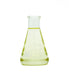 Glass beaker filled with Organic Sweet Basil Essential Oil from Essential Aura