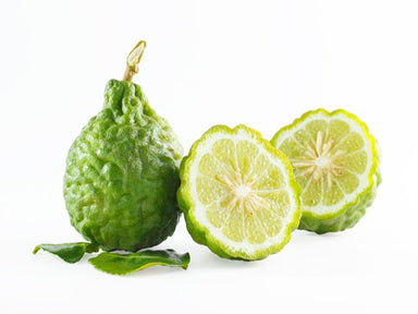 Organic bergamot citrus fruit and cut slices 