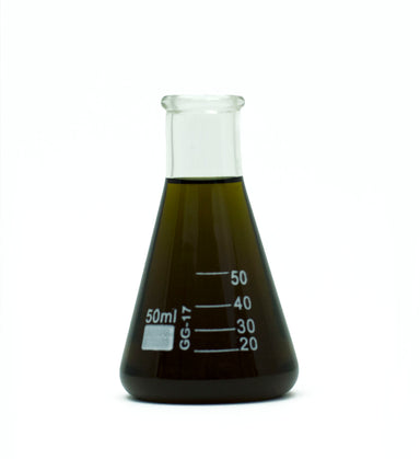 bergamot essential oil in beaker