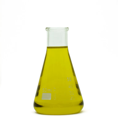 lemon essential oil in beaker