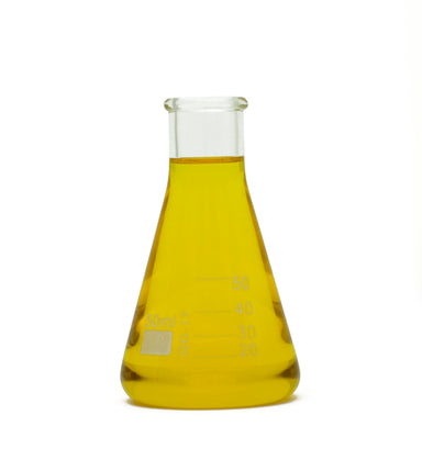 mandarin essential oil in beaker