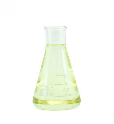 western hemlock essential oil in beaker